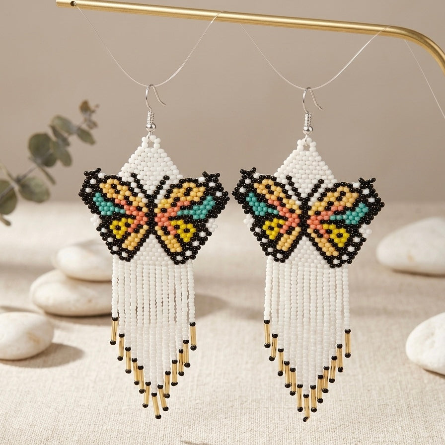 OLDTRIBES White Beaded Dancing Wing Earrings