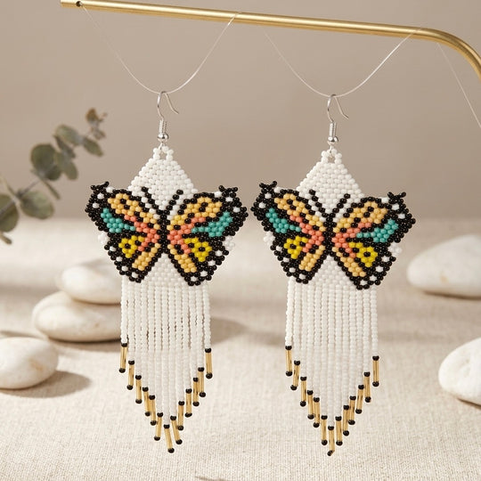 White Beaded Dancing Wing Earrings
