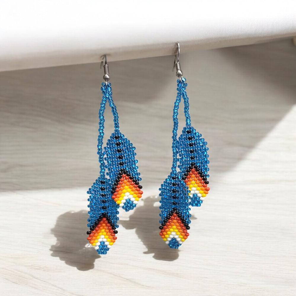 OldTribes™  light blue feather earrings